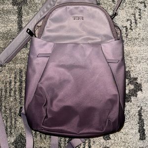 Tumi purple ombré crossbody bag. Brand new never used.